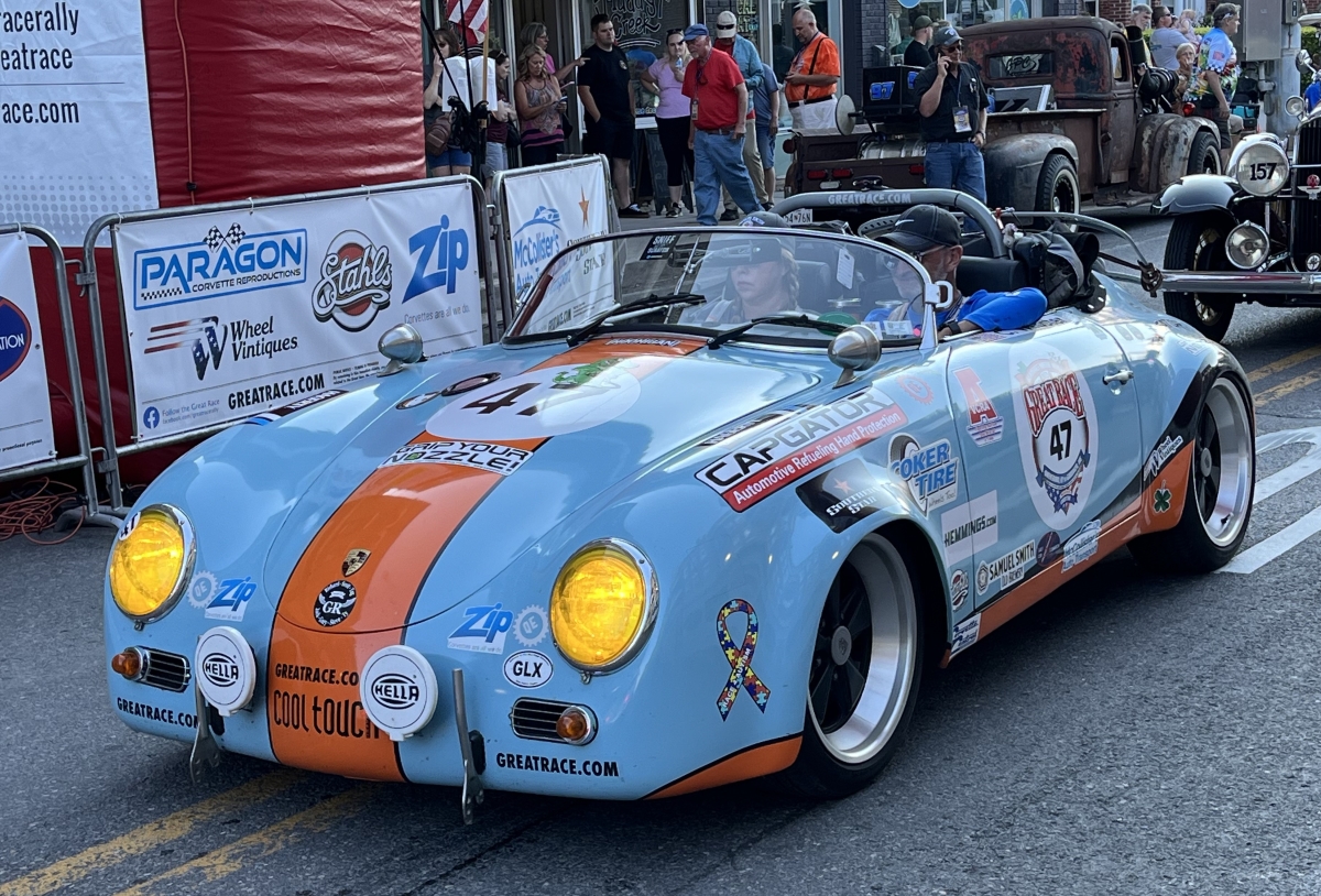 photo of a wild-looking 1957 Porsche Speedster driven by Carl and Mary Webster in the 2024 Great Race